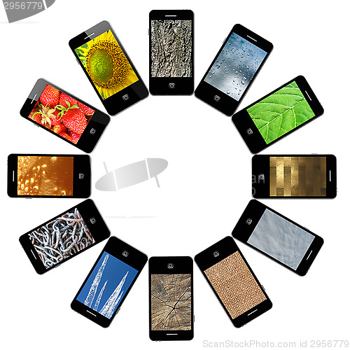 Image of Modern mobile phones with different images