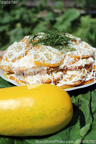 Image of cooked dish from fried squash and fresh squash