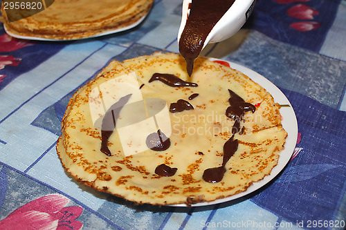Image of manufacture of pancakes with chocolate