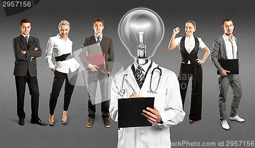 Image of Business Team With Lamp Head Doctor