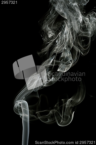 Image of Smoke trail on black background