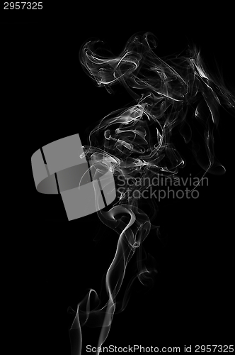 Image of Smoke trail on black background