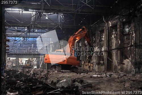 Image of Industrial interior with bulldozer inside