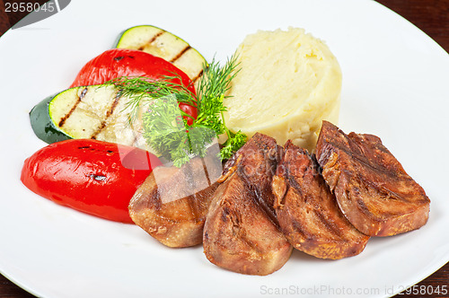 Image of tongue with grilled vegetable
