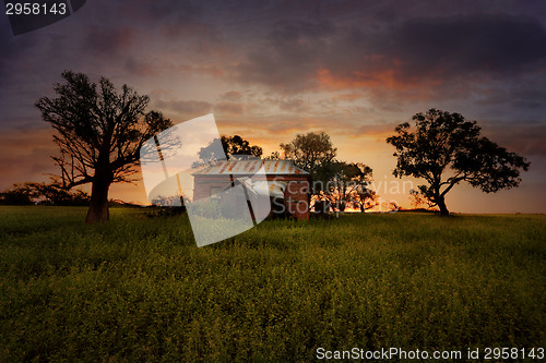 Image of Sunset Old Abandoned Farm House