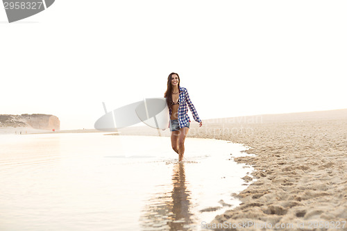 Image of Beautiful surfer girl