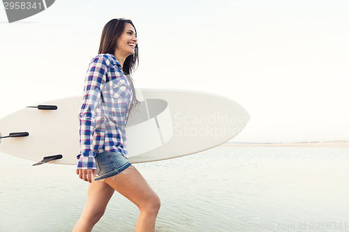 Image of Beautiful surfer girl