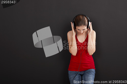 Image of Woman listen music