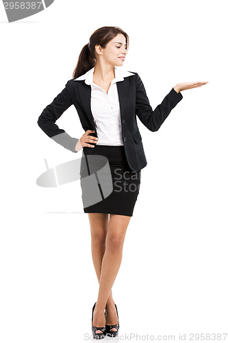 Image of Business woman showing something