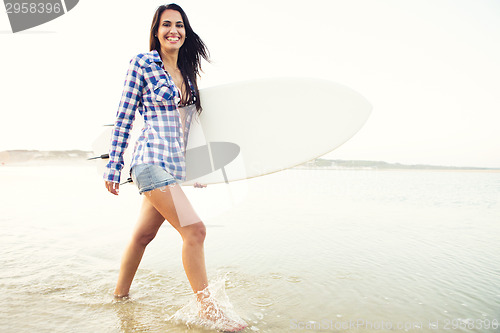 Image of Beautiful surfer girl