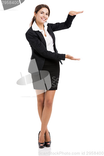 Image of Business woman showing something