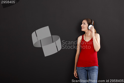 Image of Woman listen music