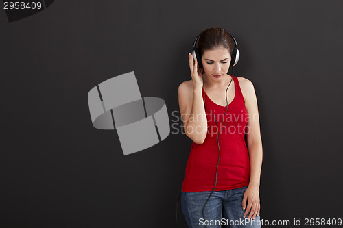 Image of Woman listen music