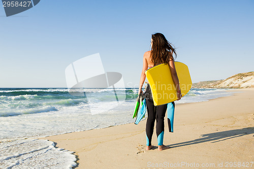 Image of Girl with her bodyboard