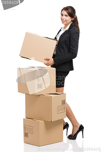 Image of Business woman with card boxes