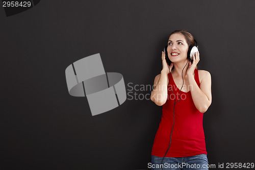 Image of Woman listen music