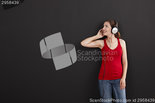 Image of Woman listen music