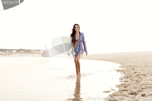 Image of Beautiful surfer girl