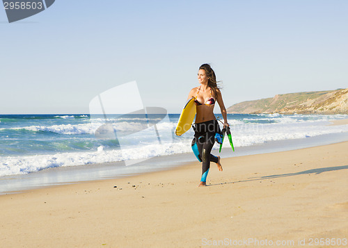 Image of Girl with her bodyboard