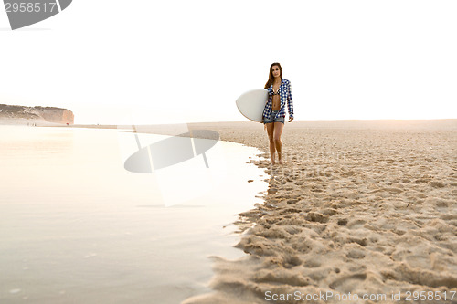 Image of Beautiful surfer girl