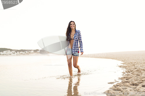 Image of Beautiful surfer girl