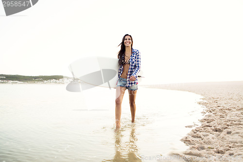 Image of Beautiful surfer girl