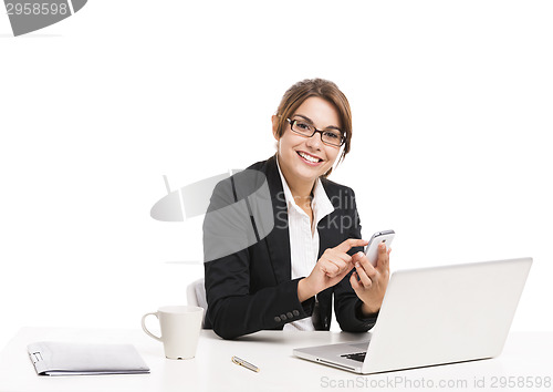 Image of Businesswoman answering phone