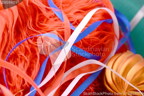 Image of Red background with white and blue ribbon