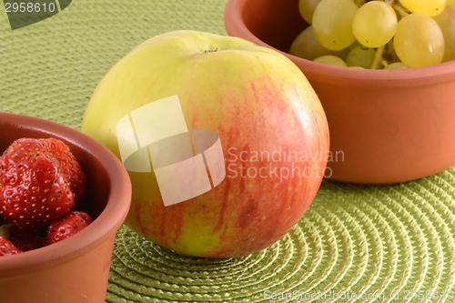 Image of fresh fruits. strawberry, apple, grape