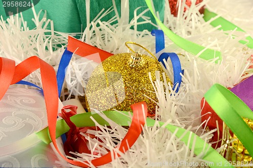 Image of Christmas background with red and blue ribbon and new year balls