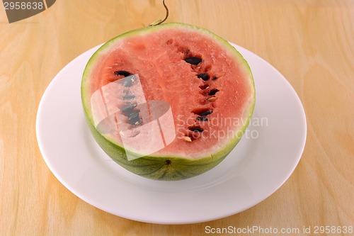 Image of fresh watermelon fruit on wooden background