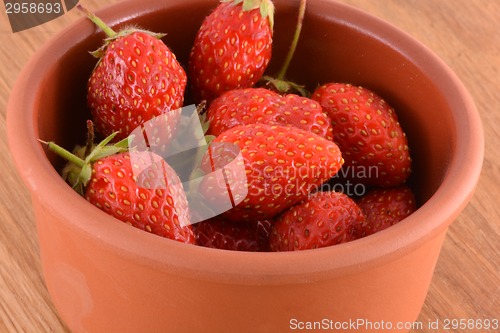 Image of Fresh strawberries on wood table