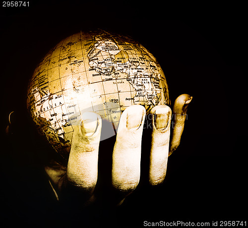 Image of Globe in a girl's hands