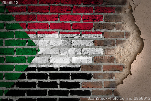 Image of Dark brick wall with plaster - Sudan