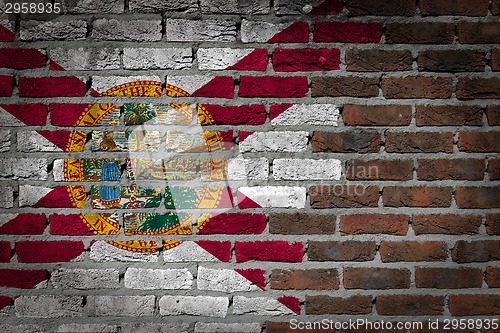 Image of Brick wall texture with flag