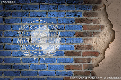 Image of Dark brick wall with plaster - United Nations