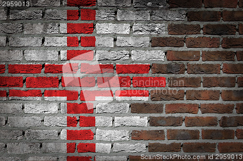 Image of Brick wall texture with flag