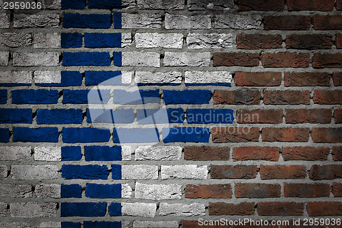 Image of Brick wall texture with flag