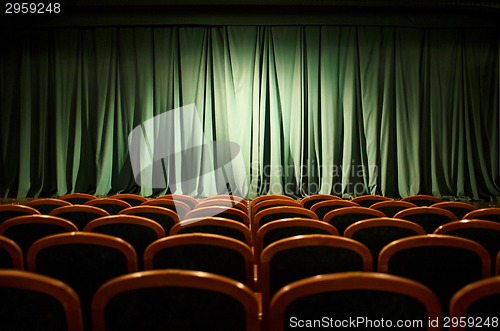 Image of Theater stage green curtains