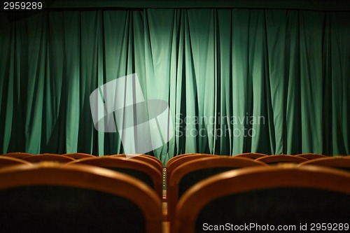 Image of Theater stage green curtains