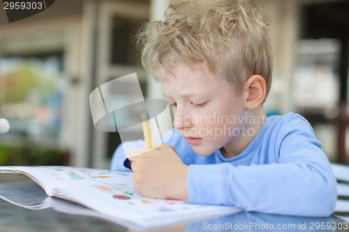 Image of kid writing