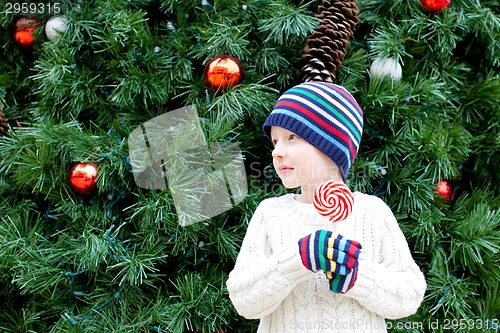 Image of kid at christmas time