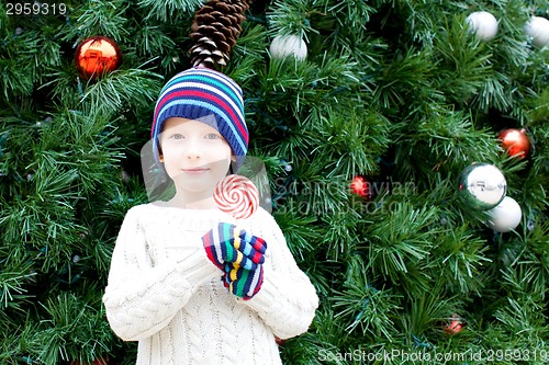 Image of kid at christmas time