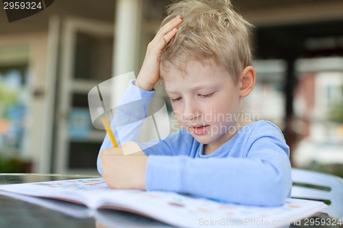 Image of kid writing