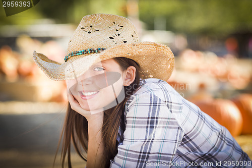 Image of Pretty Preteen Girl Portrait at the Pumpkin Patch