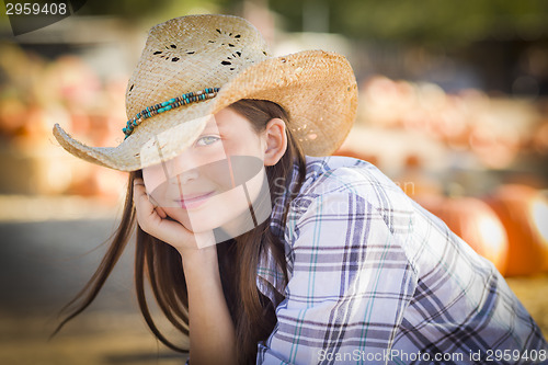 Image of Pretty Preteen Girl Portrait at the Pumpkin Patch