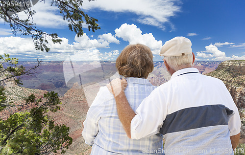 Image of Happy Senior Couple Looking Out Over The Grand Canyon