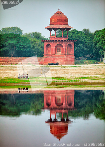 Image of Tower on the bank of the river. India, Agra