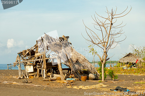Image of Ruined hut on the beach. Indonesia, Bali