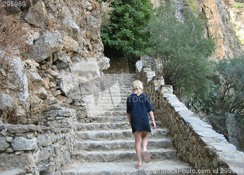 Image of Walking up stone stairs, Crete